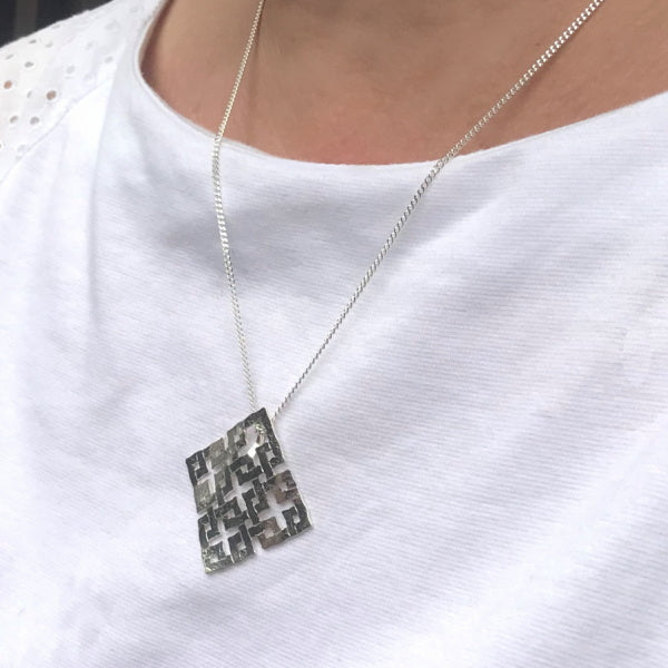 Pure silver pendant with square joints