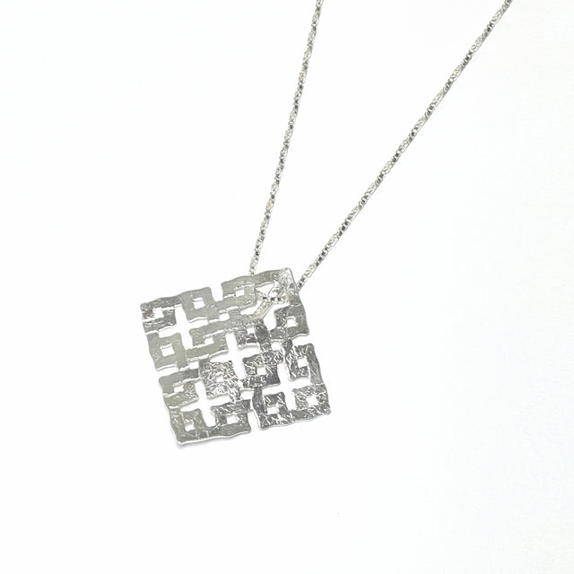 Pure silver pendant with square joints