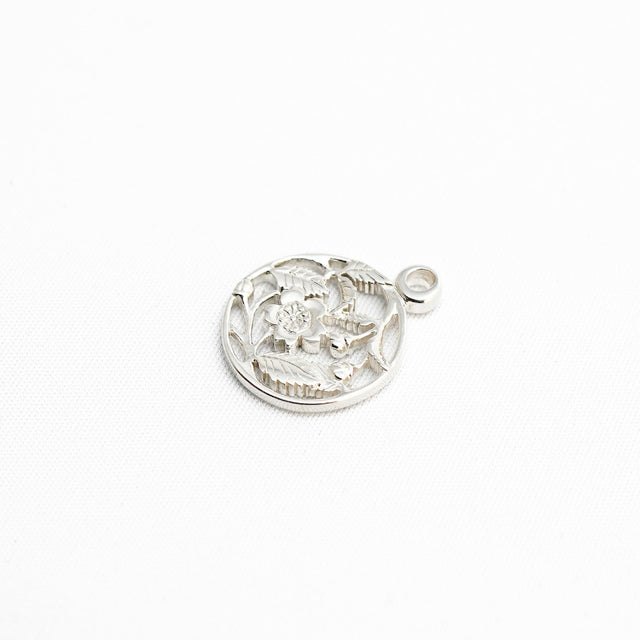 Silver incense holder with floral pattern