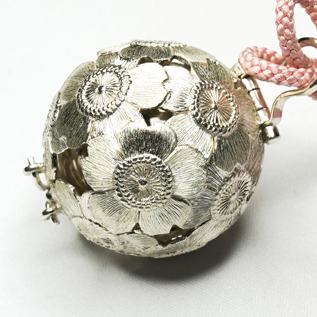 Silver incense ball with cherry blossom design
